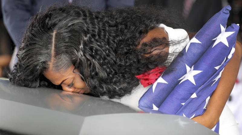\The only way he remembered my husbands name because he told me he had my husbands report in front of him and thats when he actually said La David,\ Myeshia Johnson said. (Photo: AP)