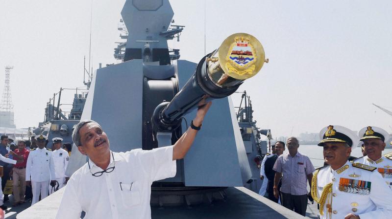 Defence Minster Manohar Parrikar and Chief of Naval Staff Admiral Sunil Lanba during the commissioning ceremony of INS Chennai in Mumbai on Monday. (Photo: PTI)