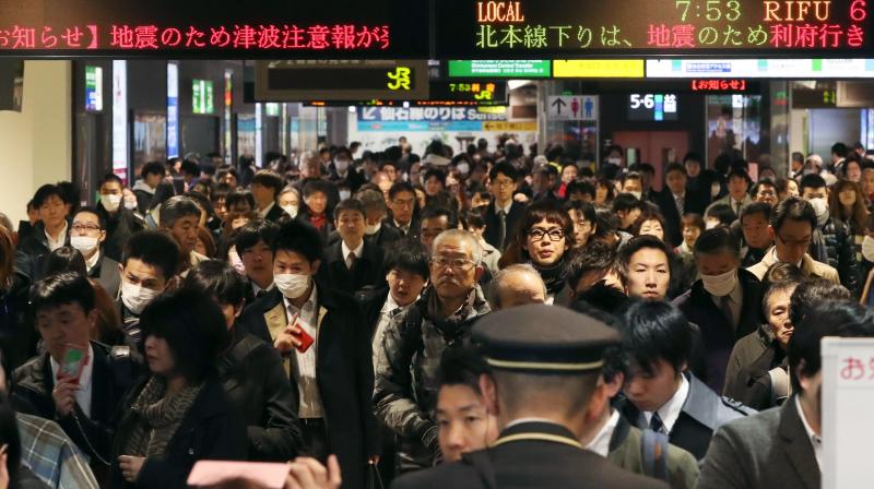 Passengers crowd at Sendai Station in Sendai, Miyagi prefecture, northern Japan Tuesday after train services are suspended following an earthquake. (Photo: AP)