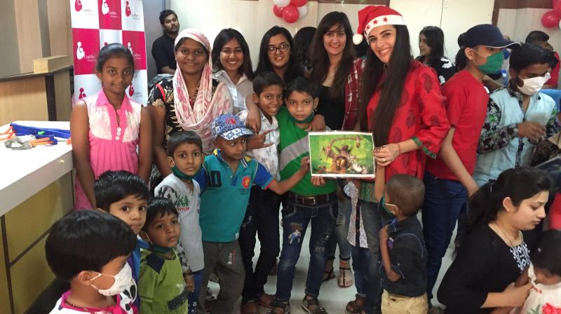 Tara Sharma spends some quality time with children at Cuddles Foundation, an NGO that works for the betterment of children diagnosed with cancer.