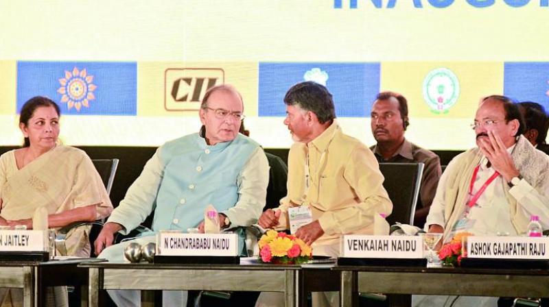 CM N. Chandrababu Naidu interacts with Union finance minister Arun Jaitley as Union ministers Nirmala Sitharaman and M. Venkaiah Naidu look on, during the 1st day of the Partnership Summit, in Visakhapatnam on Friday. (Photo: DC)