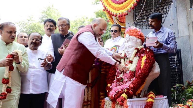 Amit Shah, who is in Karnataka for another round of campaign ahead of the polls, started the day with a visit to a Basaveshwara statue. (Photo: Twitter | @AmitShah)