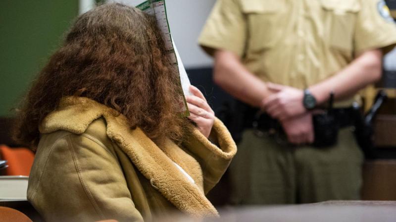 Gabriele P. hides her face in court. (Photo: AP)