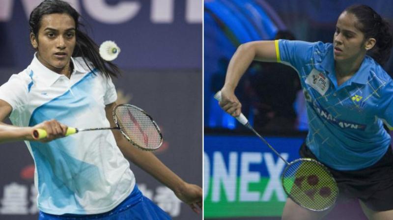 Olympic medallists PV Sindhu and Saina Nehwal on Sunday headed for a gold medal showdown at the 18th Asian Games after their quarterfinal victories ensured Indias first ever womens singles medals at the Continental event. (Photo: AFP / PTI)