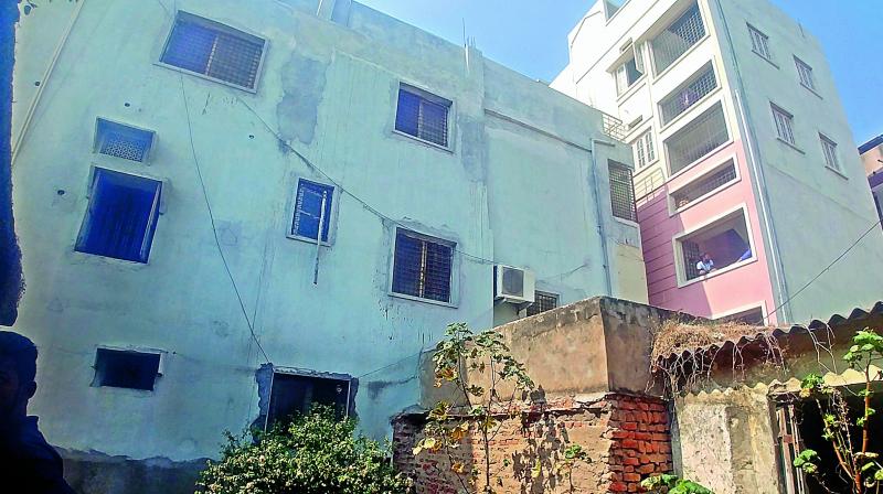 House built next to Osmania General Hospitals compound wall.   (Image DC)