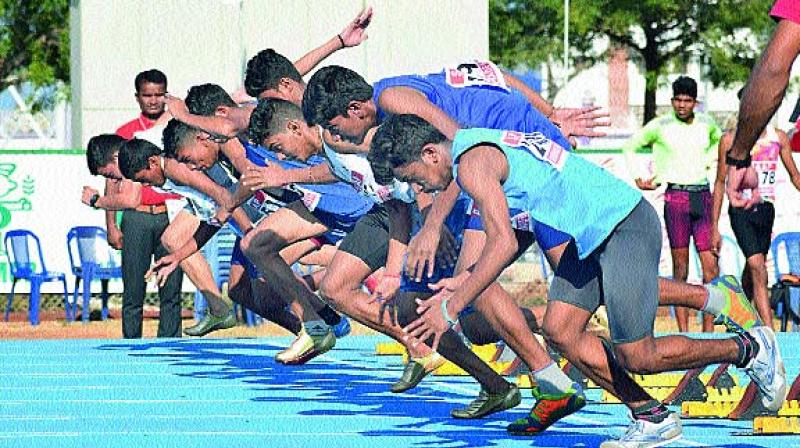Athletes from various states take part in running at the 33rd  National Junior Athletics Championship 2017 at Acharya Nagarjuna University on Thursday. (Photo: DC)