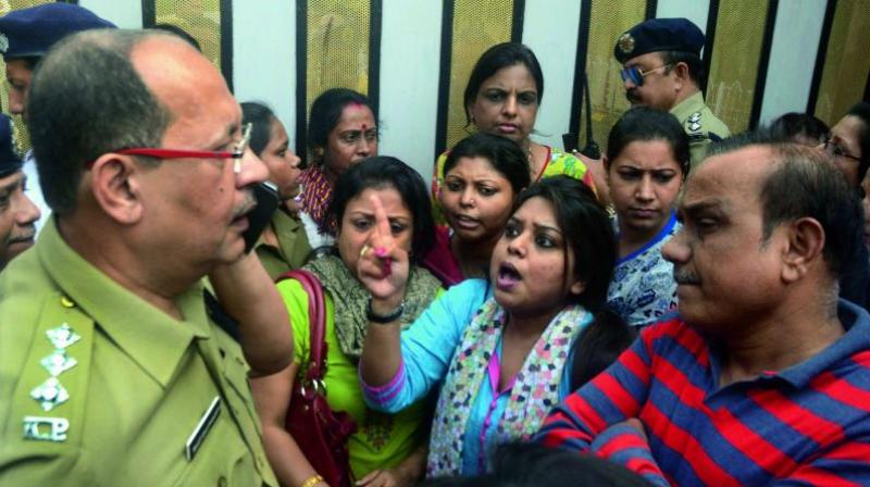 Situation intensified in Kolkata as the police lathicharged on a gathering of protesting parents, demanding the arrest of the accused. (Photo: Abhijit Mukherjee)