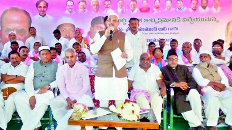 Deputy Chief Minister Mohd. Mahmood Ali addresses a meeting in Adilabad town on Sunday. Minority women joined the TRS party in the presence of the deputy CM and others. (Photo: DC)