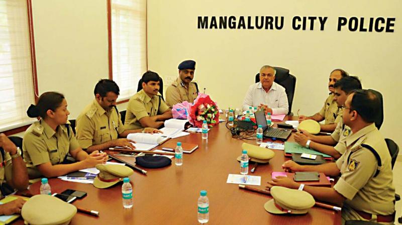 Home Minister Ramalinga Reddy holding a review meeting with police officials in Mangaluru  (Photo:DC)