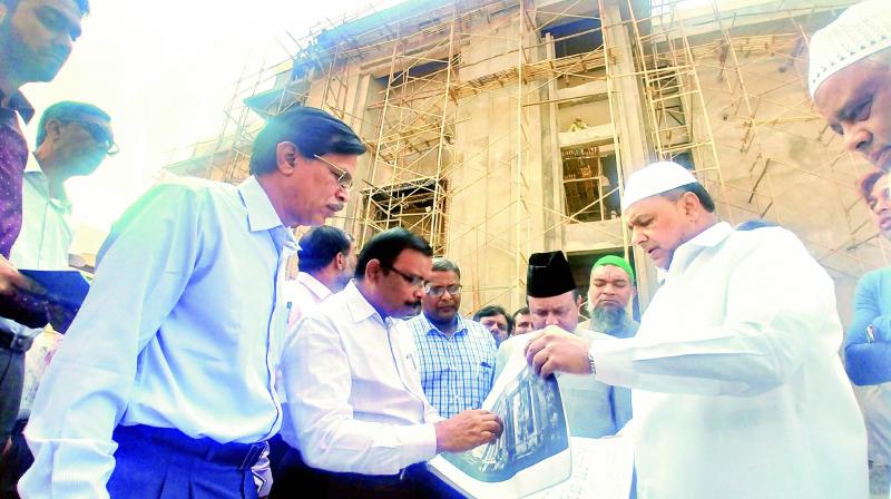 From right: TRS MLC Mohammed Saleem Telangana state Wakf board chairman along with officials from the Jamia Niazamia inspect the construction of Jamia Nazamia auditorium Old City on Saturday. (Photo:DC)
