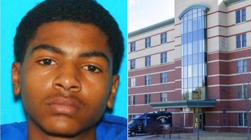 A 19-year-old student suspected of killing his parents at a Central Michigan University dormitory before running from campus was apprehended early Saturday following an intensive daylong search that included more than 100 police officers. (Photo: AP)