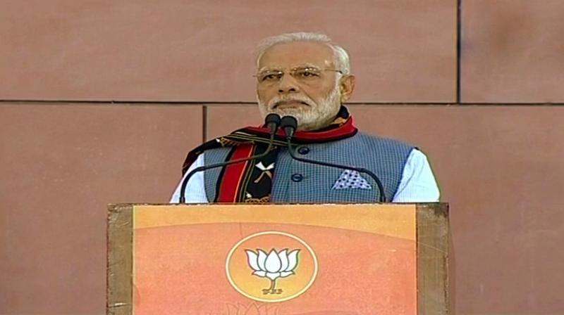 When the prayers stopped, Prime Minister Narendra Modi resumed his speech after chanting Bharat Mata Ki Jai, which was echoed by scores of BJP workers gathered at the partys headquarters. (Photo: Twitter | ANI)