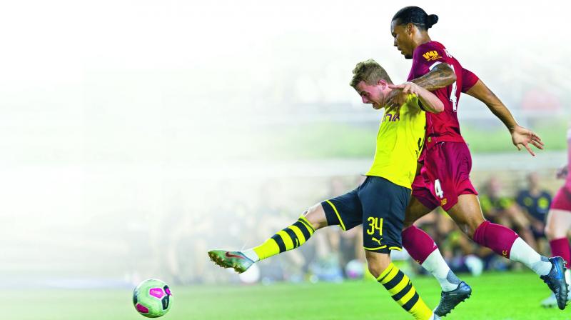 Borussia Dortmund punish rusty Reds