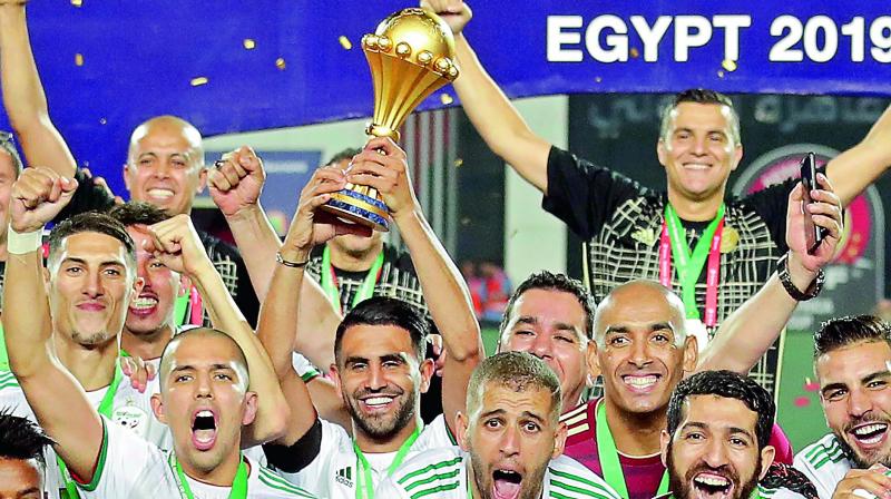 Algeria sink Sadio Mane Senegal to claim title