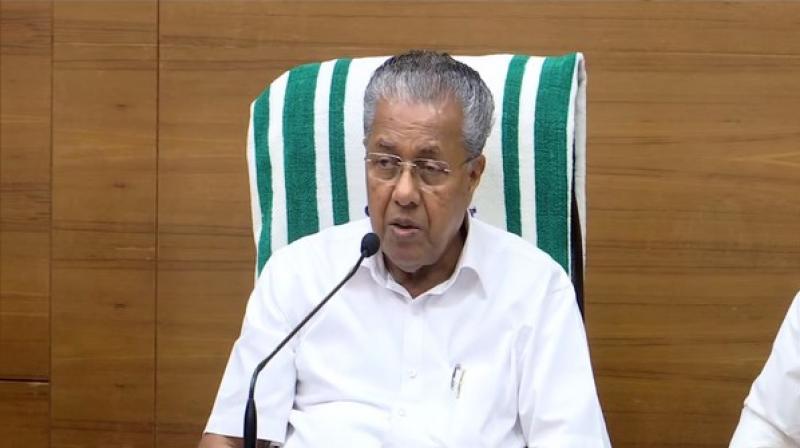 Vijayan slams \anti-social elements\ asking people not to donate to CM\s Relief Fund