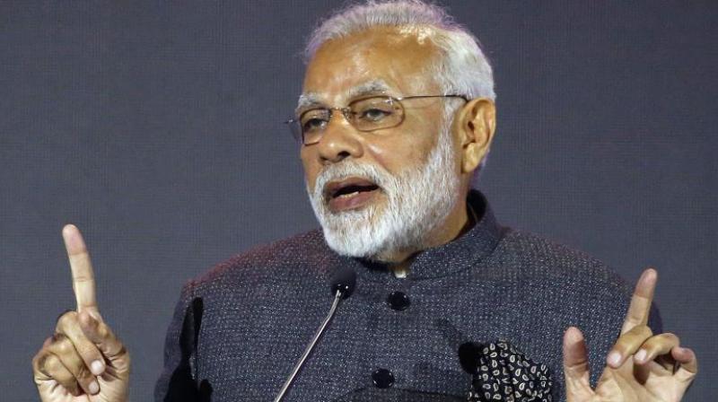 Noting that 21st century is described as Asias century, Prime Minister Narendra Modi told the cheering audience in Manila that it was the duty of every Indian to work hard to make it a century of India. (Photo: AP)