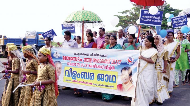 Proclamation rally being taken out ahead of fish festival in Kozhikode beach on Friday.