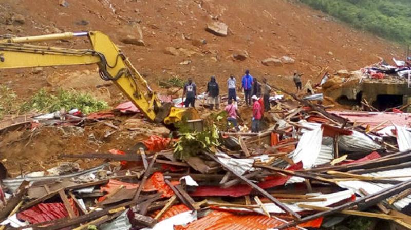 Mudslides and torrential flooding has killed many people in and around Sierra Leones capital early Monday following heavy rains, with many victims thought to be trapped in homes buried under tons of mud.