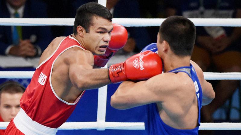 Vikas Krishan (red), a former Asian Games gold medal winner, who is also a world championships bronze-medallist, said he also cleared some mental cobwebs to get back in form. (Photo: PTI)