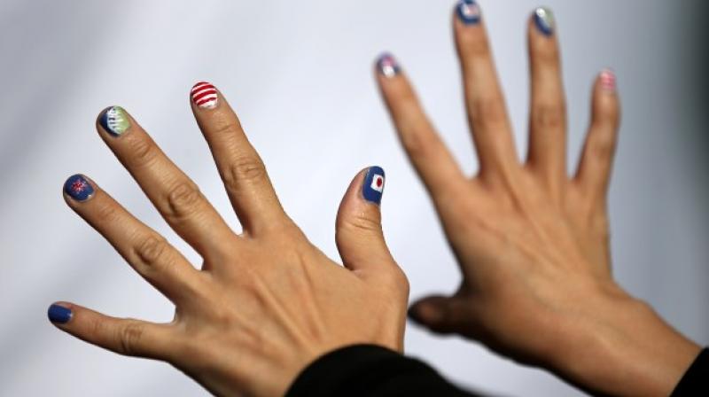 The ring finger in males is typically longer than the index finger (Photo: AFP)