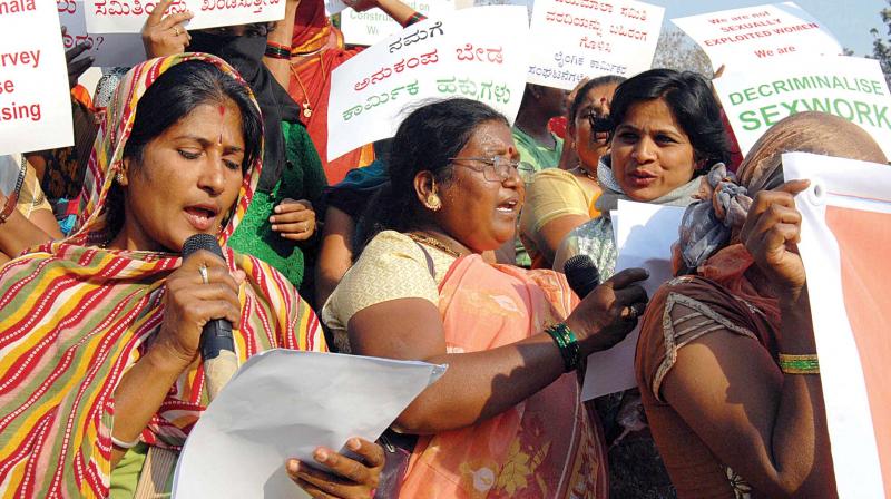 Members of Karnataka Sex Workers Union staging a protest in Bengaluru on Saturday against the Jayamala report on sex workers.(photo:KPN)