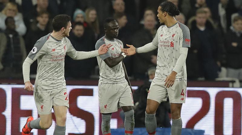 Liverpool is still top of the English Premier League by three points despite being held 1-1 by West Ham on Monday after also drawing with Leicester in the previous game. (Photo: AP)