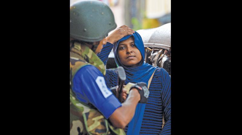 Sri Lanka Muslim women uncover out of fear