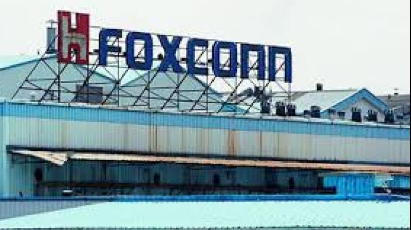 Foxconn posts fall in fourth-quarter profit, beating estimates