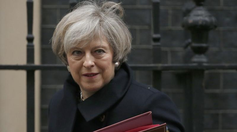 UK Prime Minister May defends decision to seek snap election
