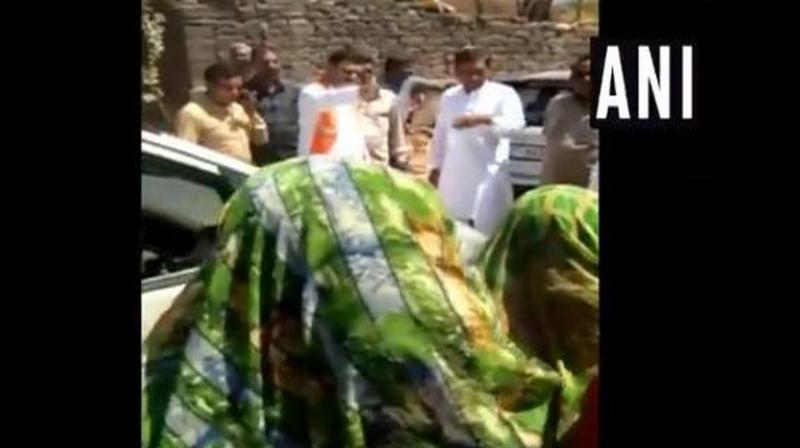 Gujarat Water Supply Minister and BJP leader Kunvarji Bavaliya questioned a group of women, who were protesting against drinking water crisis in their village, whether they voted for him or not in the last election. (Photo: ANI)