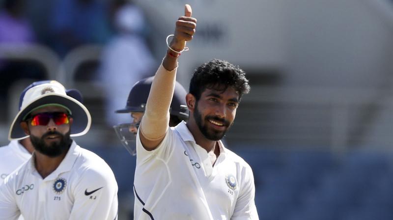 Bumrah wreaked havoc in the 9th over as he registered a hat-trick, and, with this, he became only the third Indian after Harbhajan Singh and Irfan Pathan to achieve the feat in the longest format of the game. (Photo: AP)