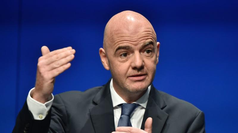 FIFA chief urges action after racist abuse halts Serie A game