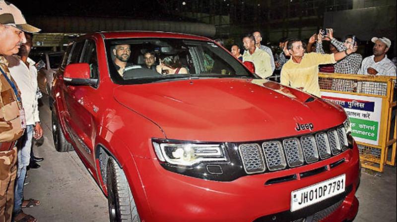 MS Dhoni takes his â€˜Red Beastâ€™ for a spin; see photos and video
