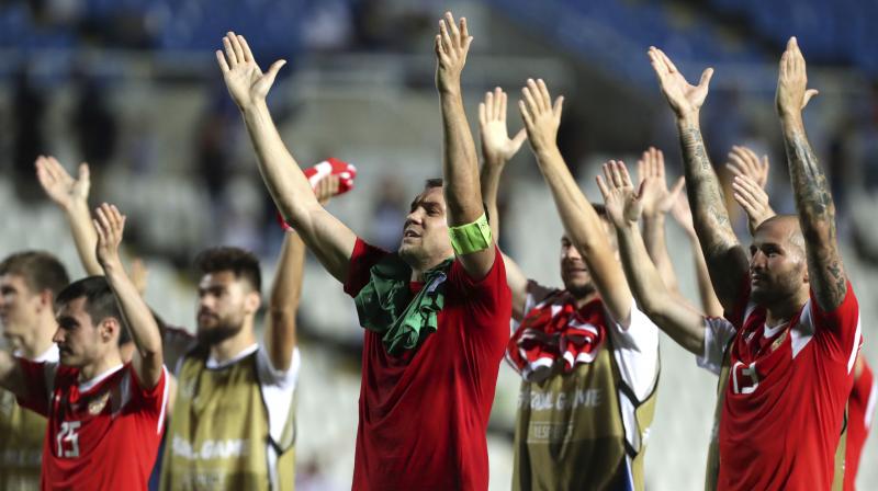 Russias Artem Dzyuba, center, celebrates with teammates at the end of the Euro 2020 group I qualifying soccer match between Cyprus and Russia at GSP stadium in Nicosia, Cyprus. (Photo: AP)