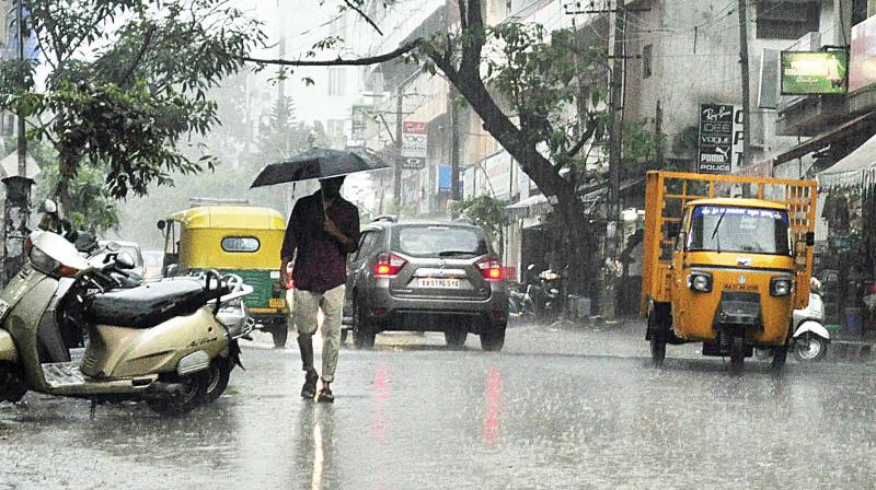 People enjoyed sudden rain in BTM layout in Bengaluru on Thursday 	KPN