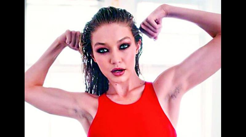 Gigi Hadid in a recent advertisement boldly posed with her armpit hair.