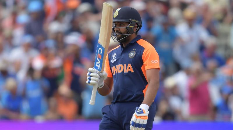 Rohit Sharma went on to score 102 runs against England. He was finally dismissed by Chris Woakes in the 37th over. (Photo:AFP)