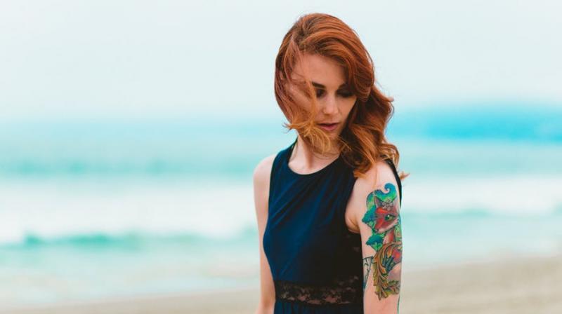 Study claims having a tattoo can land you a job. (Photo: Pexels)