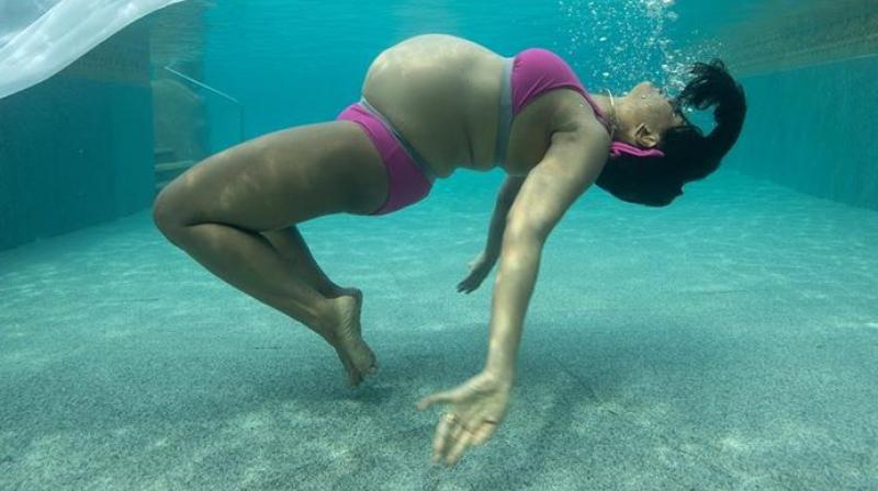 Adventurous mom: Sameera Reddy flaunts baby bump in underwater photo shoot; see pics