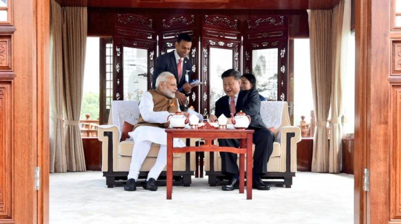Prime Minister Narendra Modi and Chinese President Xi Jinping began their last round of one-on-one talks with a walk around the famous East Lake followed by an hour-long boat ride. (Photo: Twitter/@MEAIndia)