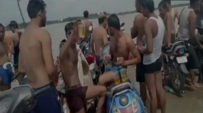 Hapur: Kanwariyas caught drinking at banks of Ganga; police assure action