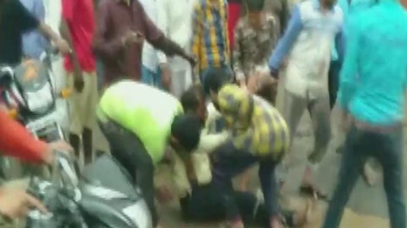 MP man thrashed, dragged by his collar on road in Dewas