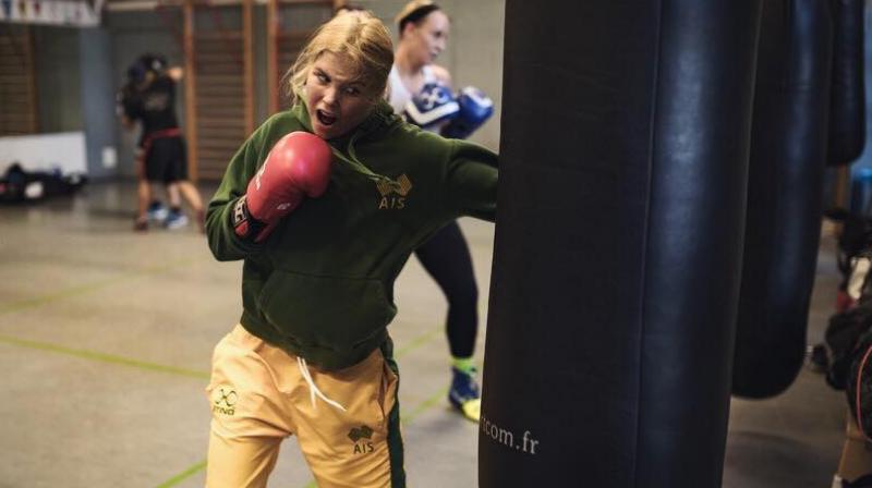 Taylah Robertson( Green) has secured the first medal of the Gold Coast Commonwealth Games nine days before her first bout. (Photo: Facebook / Taylah Robertson)