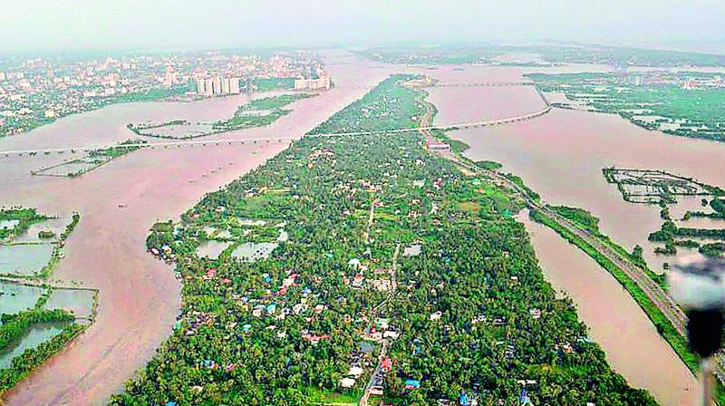 An aerial view of the floods in Aluva after heavy rains, in Kerala.	(Photo: PTI)