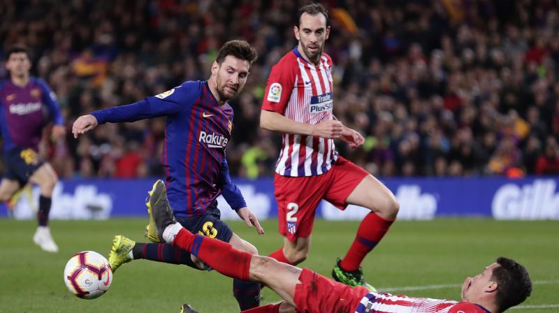 Atletico produced a gutsy second-half display, expertly shackling Barca, but the Catalans finally found a way past the visitors outstanding goalkeeper Jan Oblak with a superb curling shot from Suarez in the 85th minute.