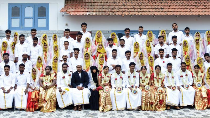 50 couples including five Hindu pairs, tied nuptial knot on Saturday.