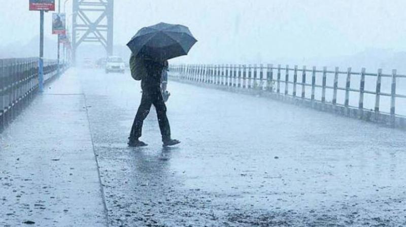 Sircilla: Heavy rains pull down part of bridge