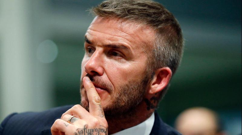 David Beckham gets six-month driving ban for using phone at wheel