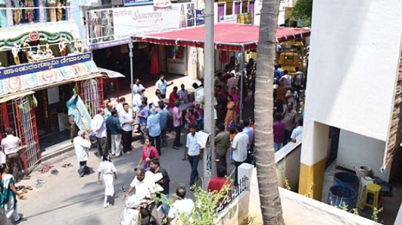 The main road of Thygarajanagar blocked for  celebrations of a temple 	( Image: DC)
