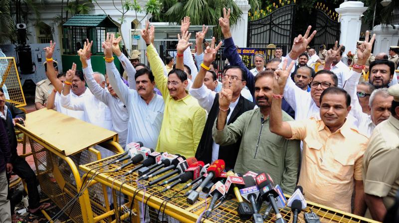 Gujarat Congress MLAs comes out of Rajbhavan after meeting with Governor in Bengaluru. (Photo: PTI/File)